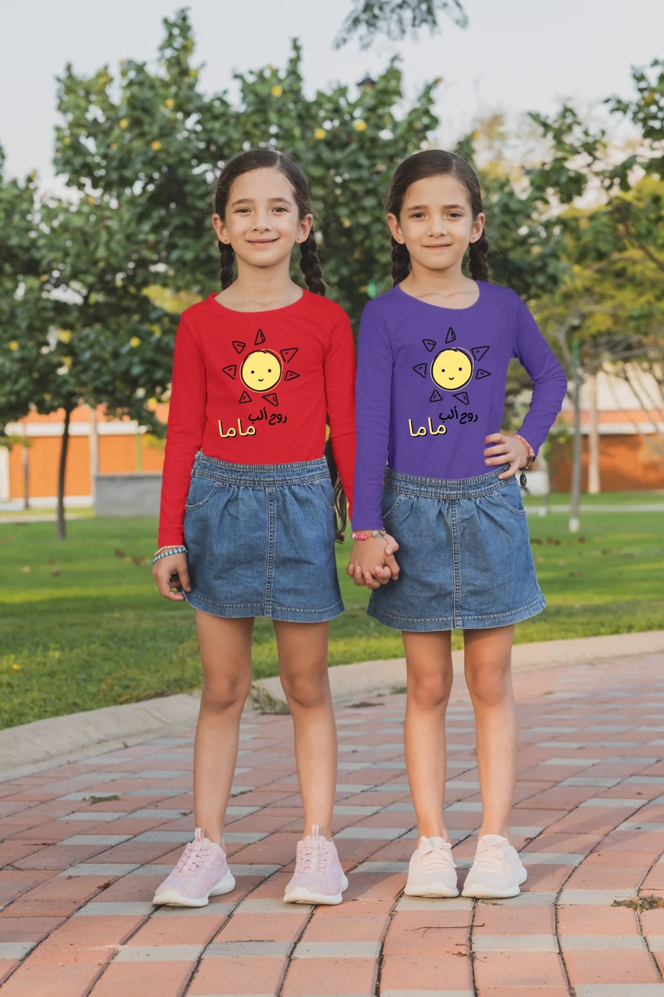 mockup-of-two-sisters-with-long-sleeve-tees-holding-hands-at-a-park-30701