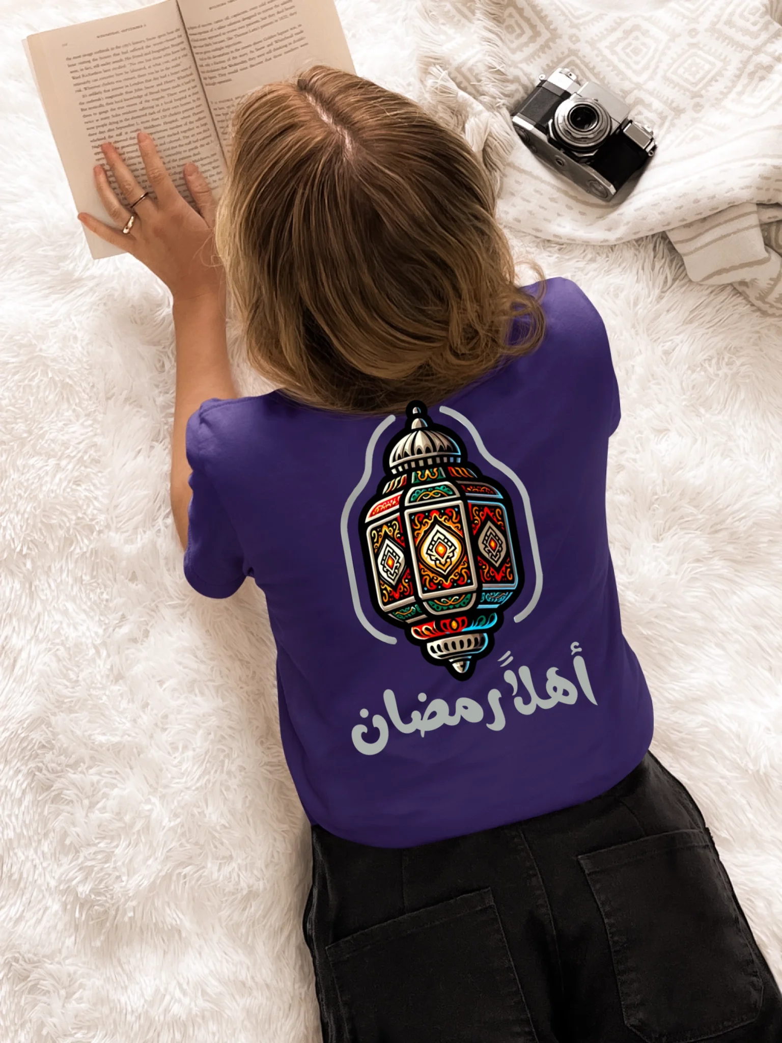 back-view-t-shirt-mockup-of-a-woman-reading-a-book-at-home-m37316