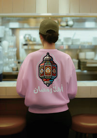 back-view-sweatshirt-mockup-featuring-an-ai-created-woman-waiting-in-a-restaurant-m51325