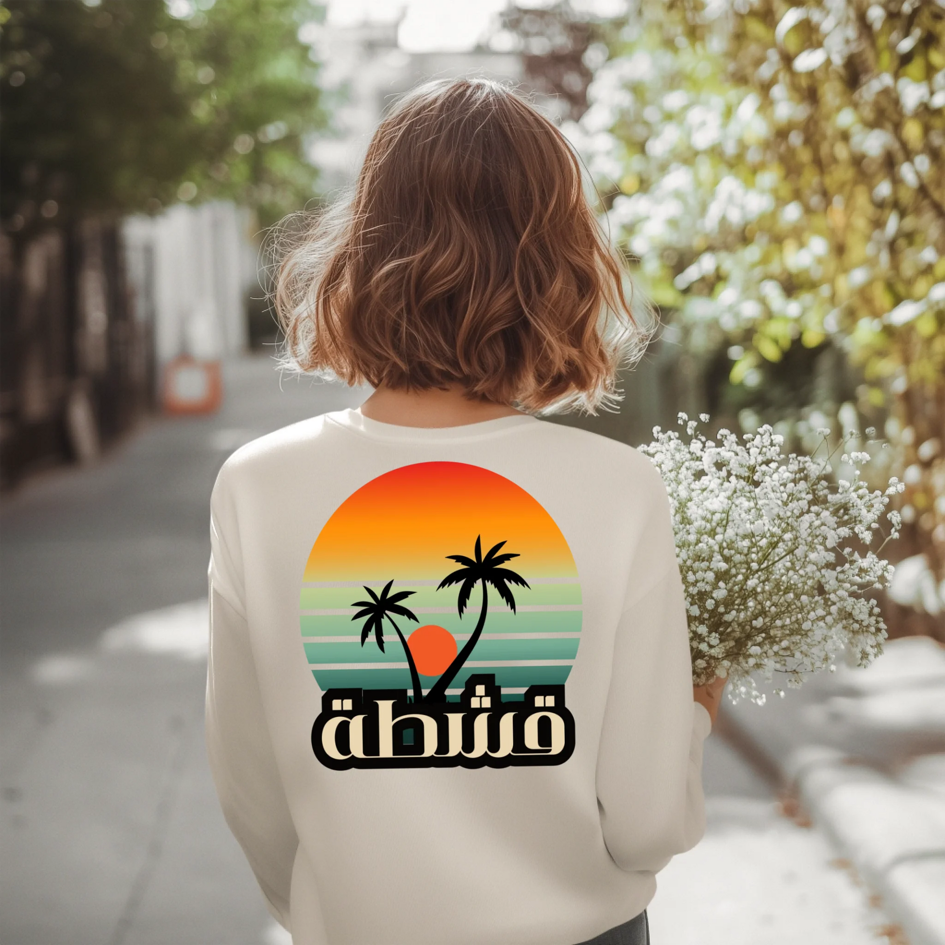 back-view-long-sleeve-tee-mockup-featuring-an-ai-created-woman-holding-flowers-m52582
