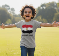 Child wearing a t-shirt with an Egyptian flag design outdoors